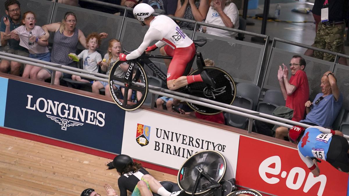Watch video of cyclist Matt Walls go flying into the crowd after a major crash at the Men's cycling at the Commonwealth Games velodrome