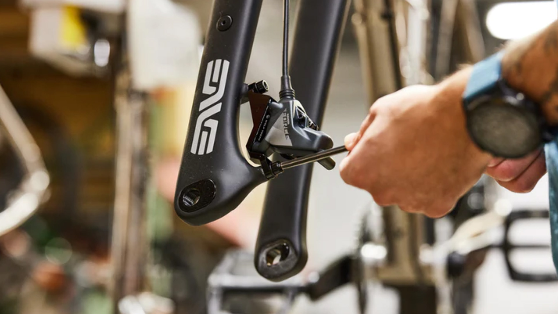 A flat mount disc caliper on a post mount frame?  There's an adapter for that