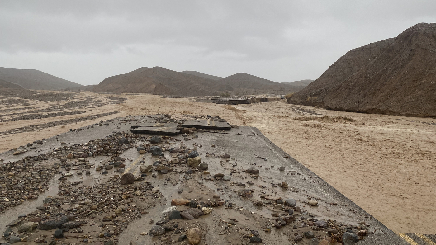 A key Death Valley road buried in floods remains closed : NPR