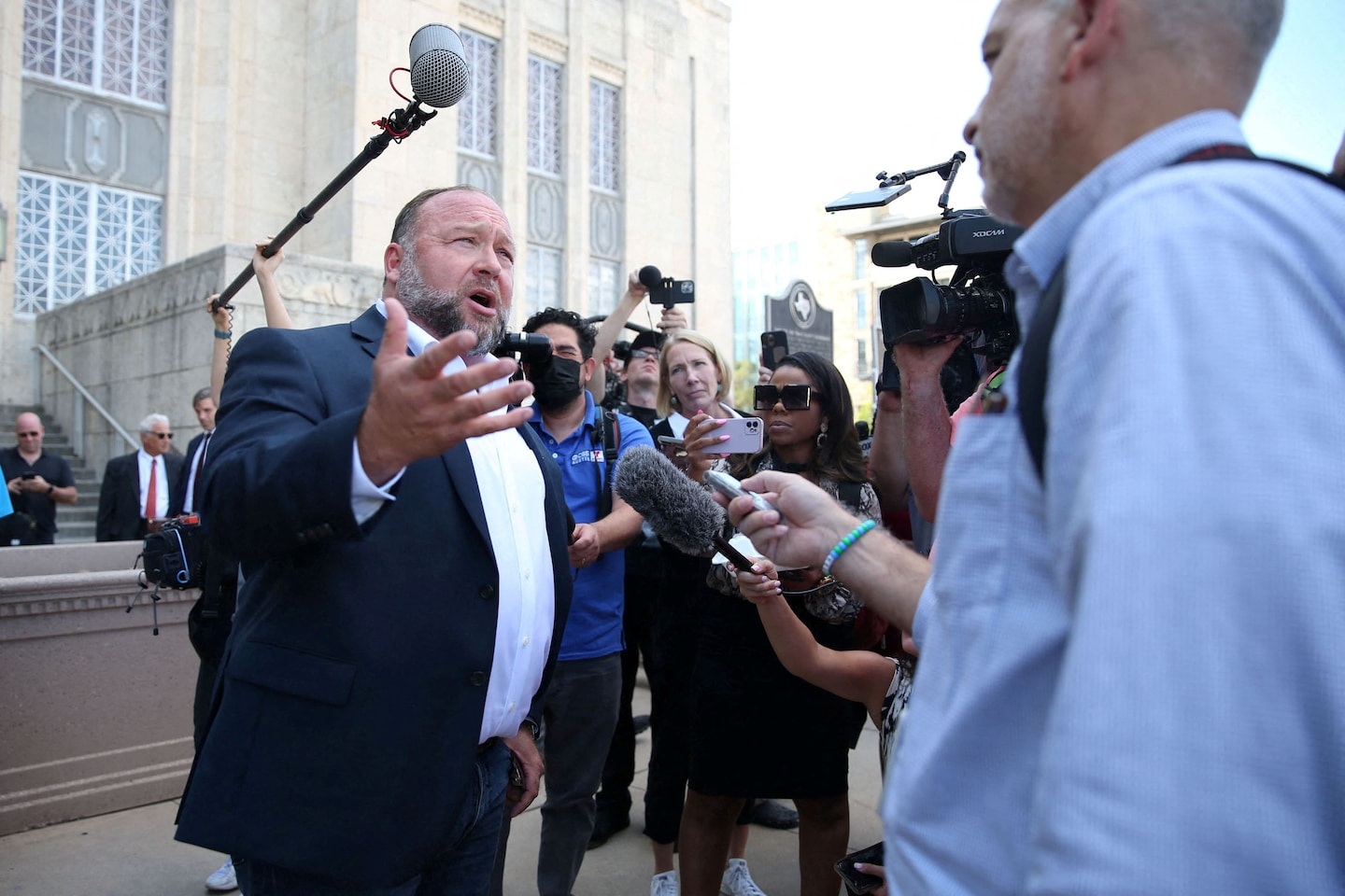 Alex Jones was embraced by Donald Trump, Joe Rogan years after Sandy Hook lies