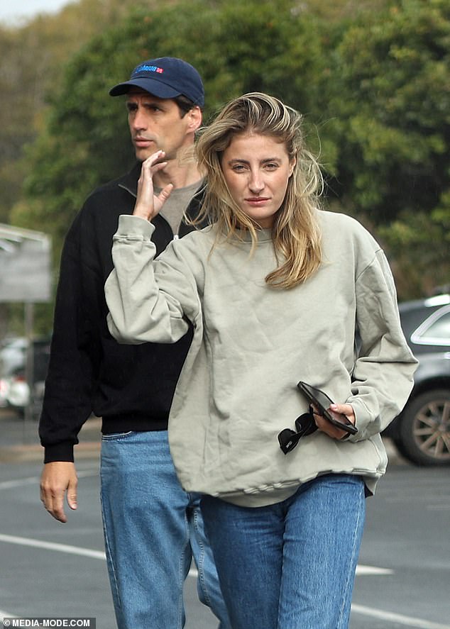 The morning after the night before: Andy Lee and girlfriend Rebecca Harding looked worse for wear as they picked up a greasy breakfast in Byron Bay on Saturday the day after Pat Cummins and Becky Boston's lavish wedding
