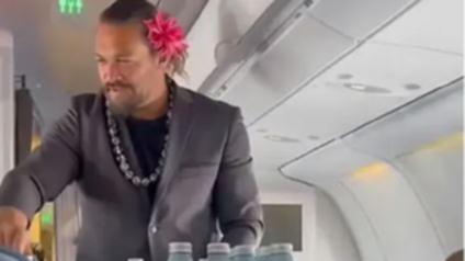 Aquaman star Jason Momoa poses as flight attendant, hands out water to surprised Hawaiian Airlines passengers