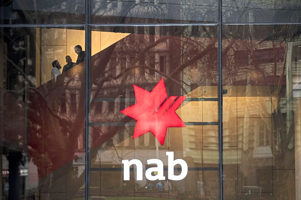 Australia's NAB warns of higher costs again
