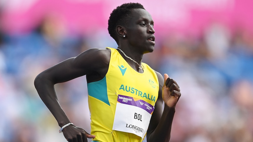 An Australian male athlete runs during a heat of the men's 800 metres at the Commonwealth Games.