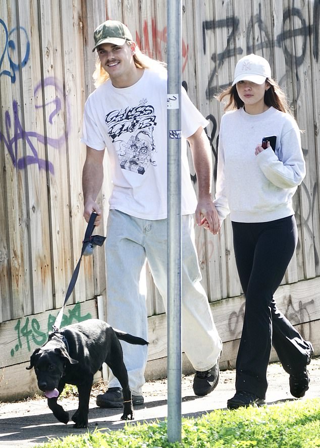 AFL star Bailey Smith confirmed his romance with girlfriend Gemma Dawkins on Sunday when the couple stepped out in Melbourne.  Both pictured