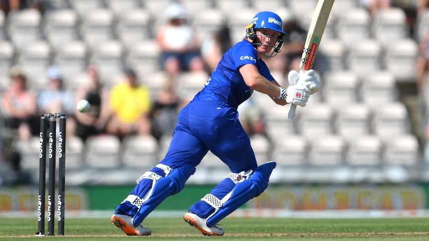 Beth Mooney completes a shot off her pads to the on side