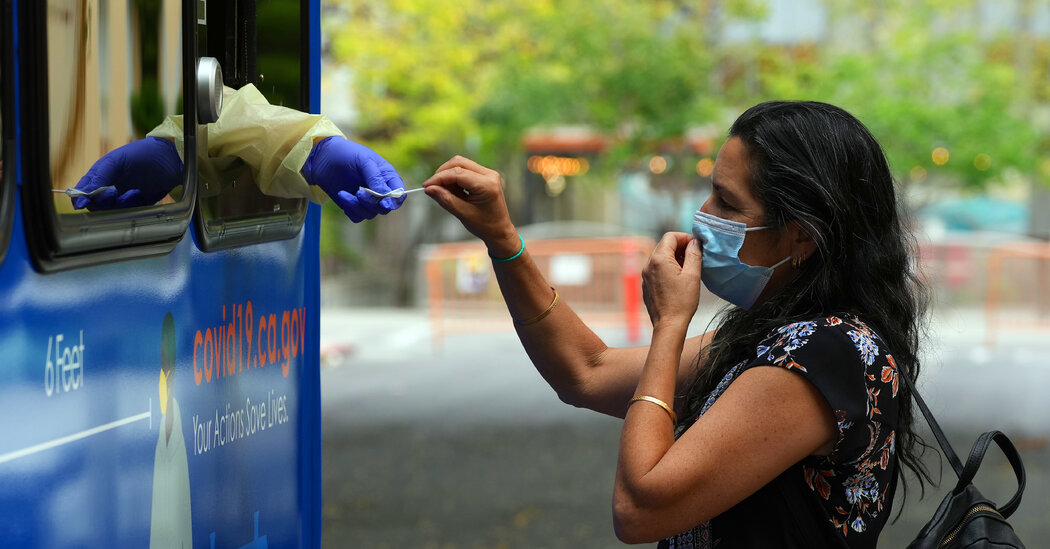 CDC Eases Covid Guidelines, Noting Virus Is 'Here to Stay'