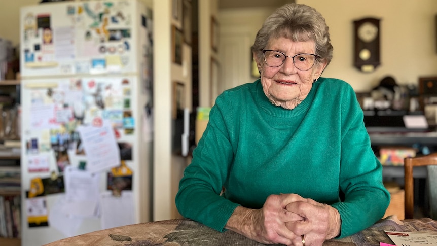 woman sitting at a table