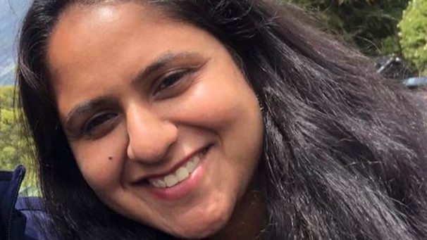 Rosy Loomba smiles at the camera.