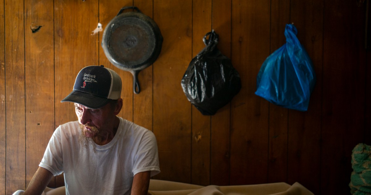 Fearing looters, Kentucky flood victims refuse to leave wrecked homes