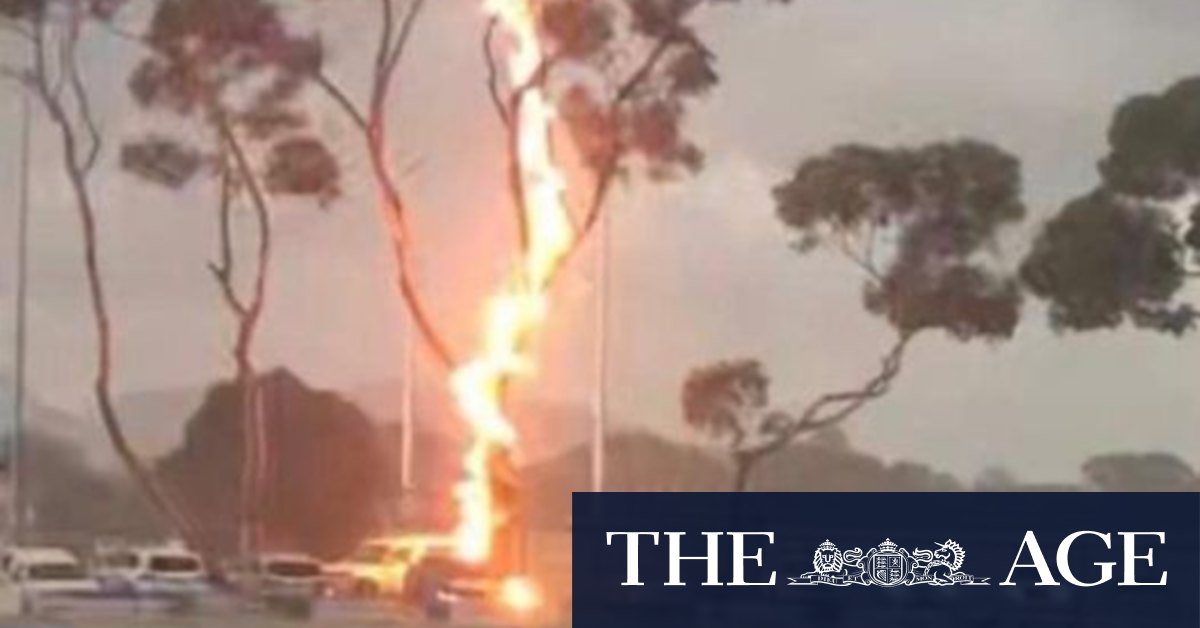 Footy players run for cover Bisinella Oval in Lara