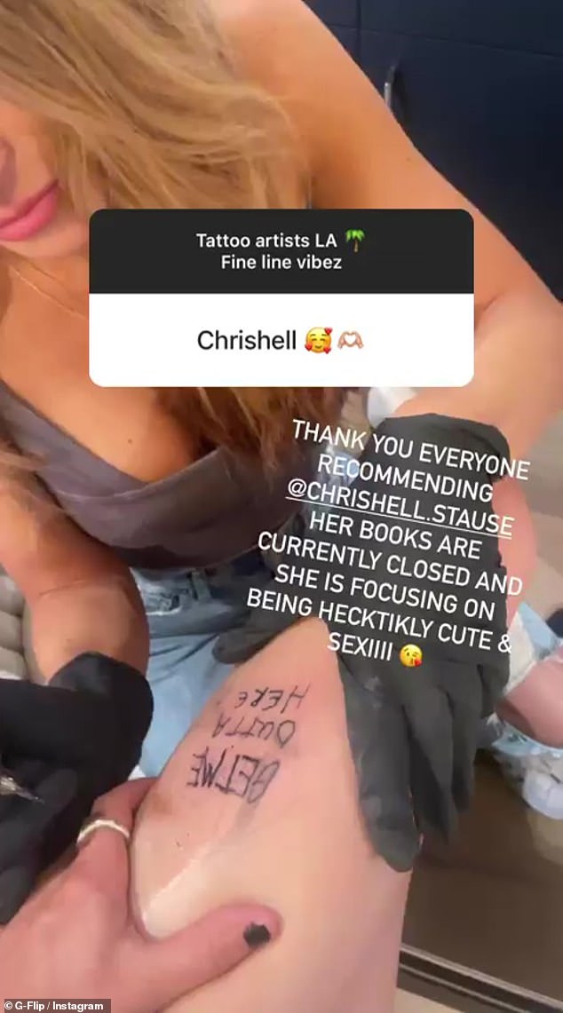 Sweet: G Flip gushed over 'cute and sexy' girlfriend Chrishell Stause as she shared a throwback snap on Tuesday of the Selling Sunset star giving them a tattoo