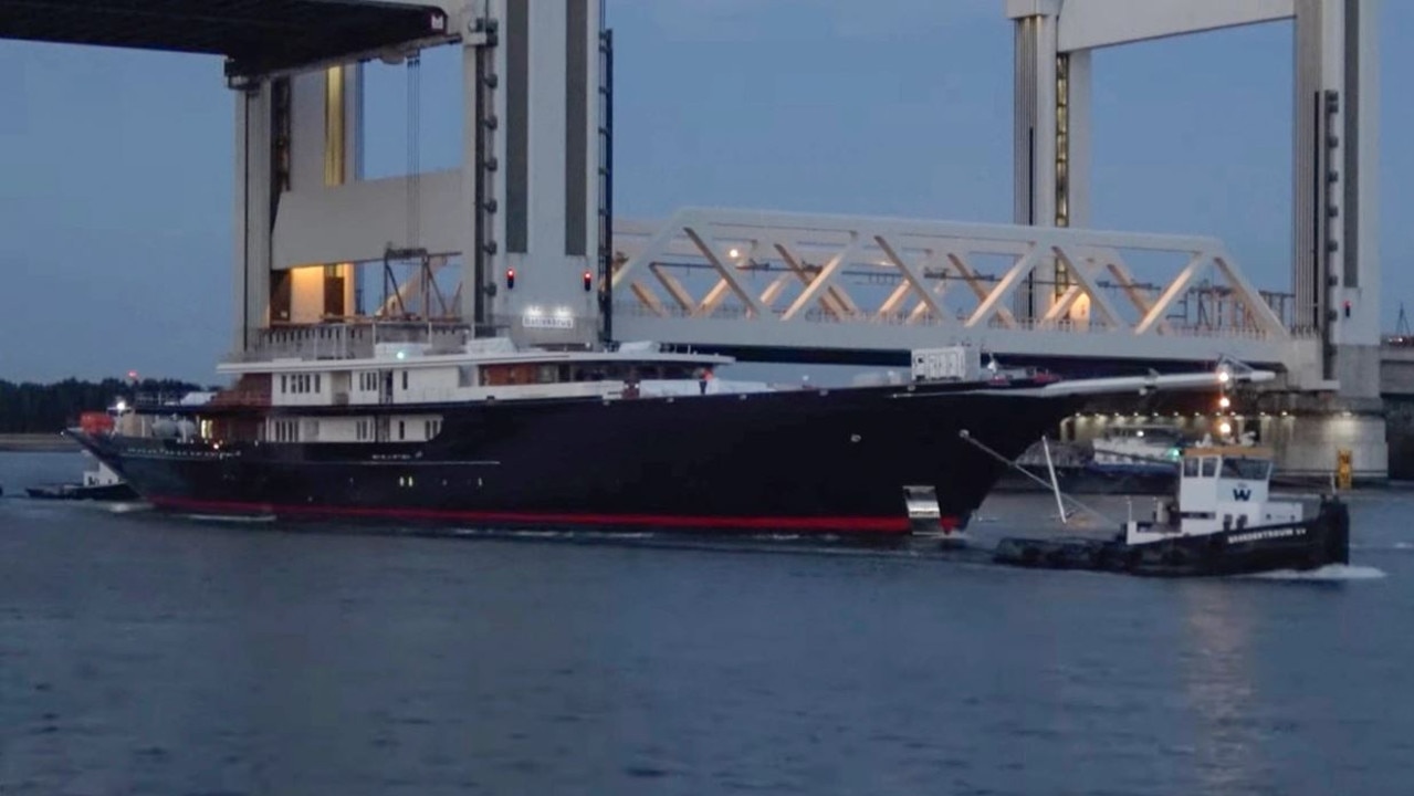 Jeff Bezos' unfinished mega yacht towed away after threats of egging