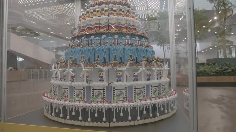 Lego celebrates 90th year with 94,128-piece birthday cake at toy company's hometown