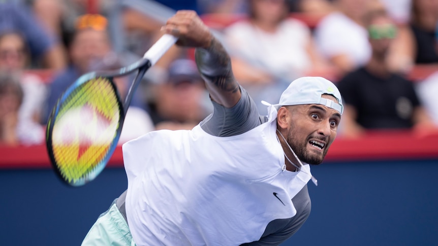 Nick Kyrgios serves against Daniil Medvedev at the Montreal Masters tennis tournament.