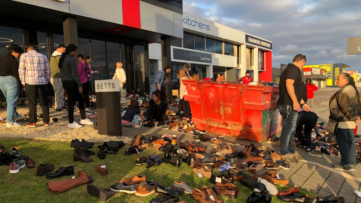 Osborne Park: Crowd spotted dumpster diving for shoes at Betts