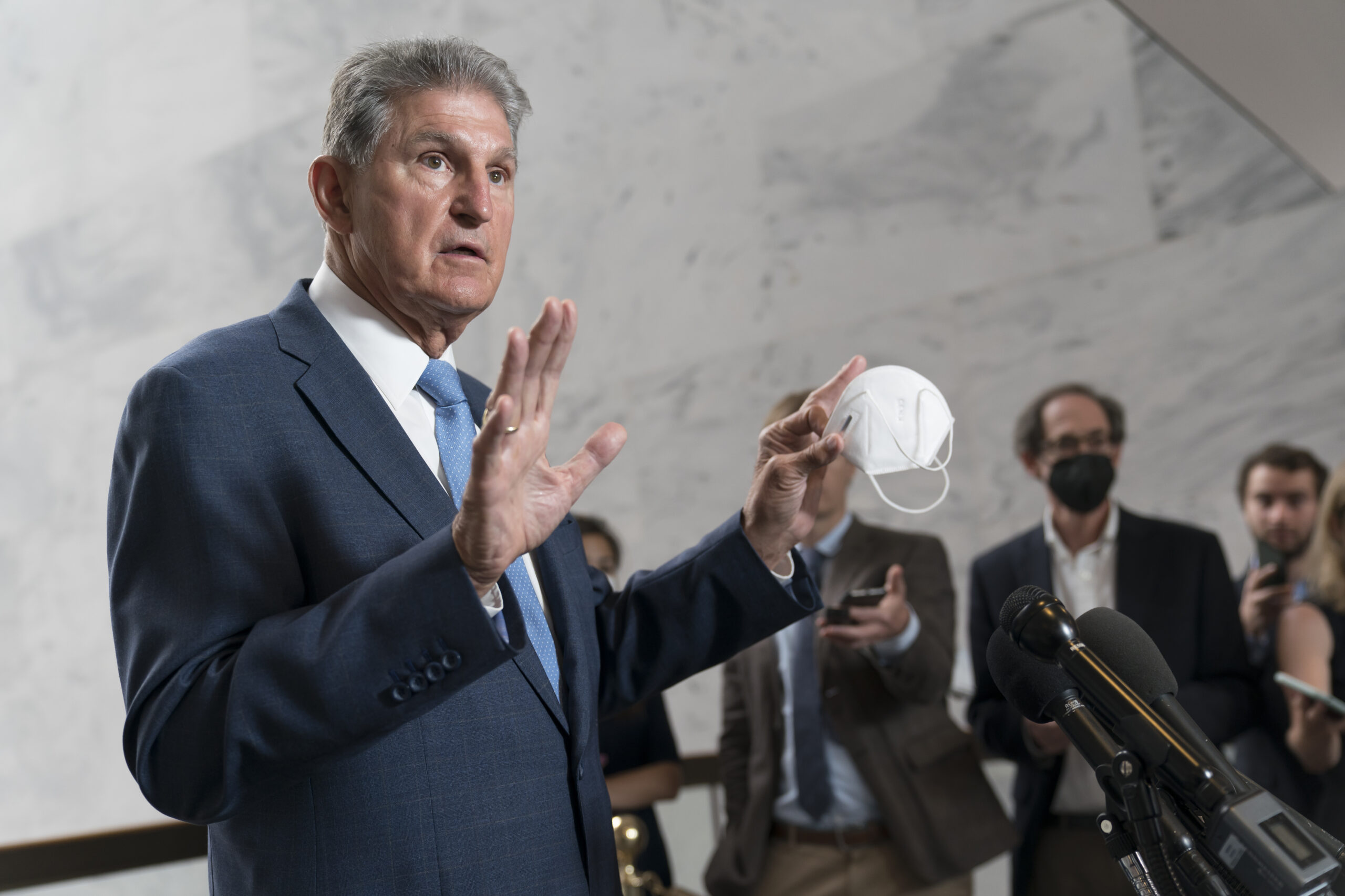 Republican push to overturn Biden permitting rules passes Senate, with Manchin's support