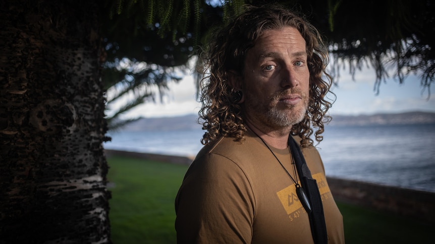 Gavin Tunstall glances at the camera.