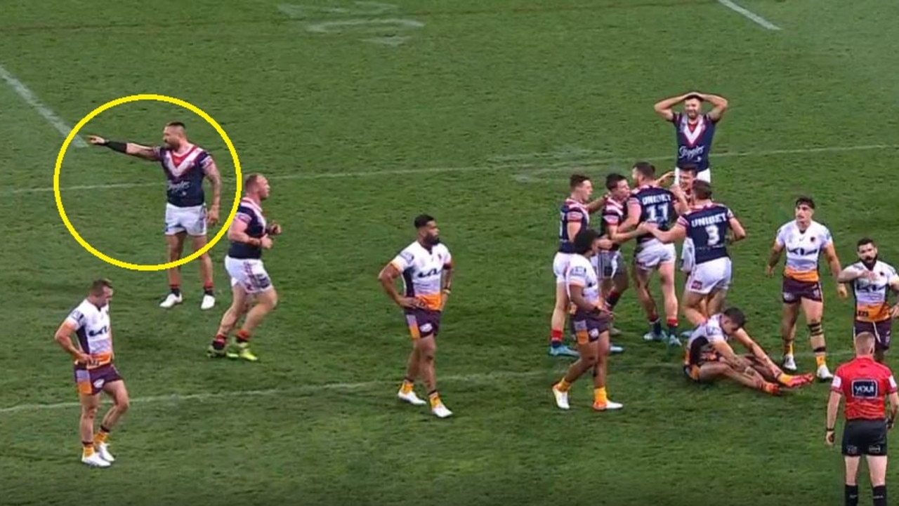 Sydney Roosters coach Trent Robinson reacts to Sam Walker copping spray from teammates
