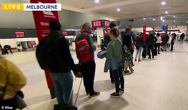 Dozens of travelers at Melbourne Airport have been warned to expect delays as giant queues are seen snaking across the terminal on Monday morning (pictured)