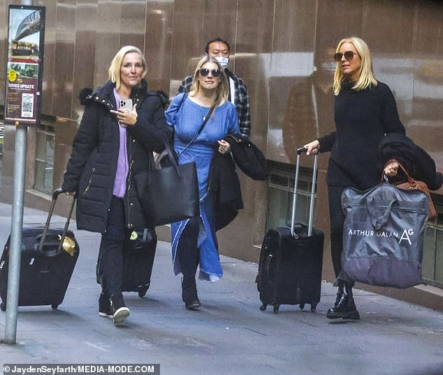 Pajama party!  The Project's Carrie Bickmore and Fifi Box checked out of their Sydney hotel on Friday after a wild girls' night out