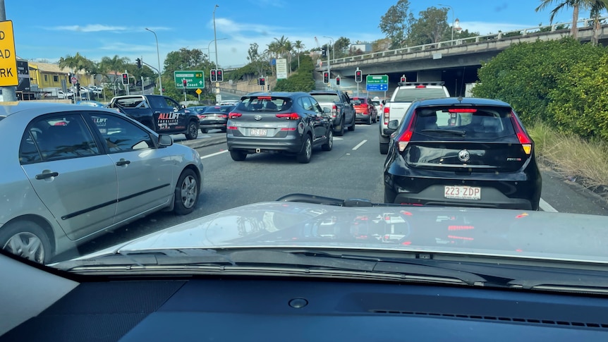 Cars lined up in a traffic jam.