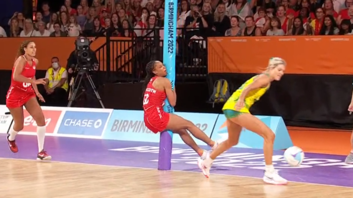 Watch video of the moment England goal defense Layla Guscoth smashes into the post against Australia's Diamonds at the Commonwealth Games netball in Birmingham