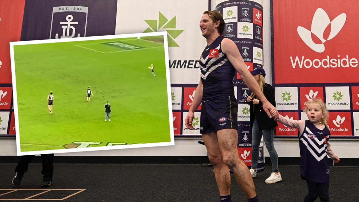 Western derby 55: Fremantle Dockers veteran David Mundy shares a moment with family after final derby victory