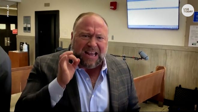 Alex Jones testifies Sandy Hook shooting was '100 percent real' during defamation trial